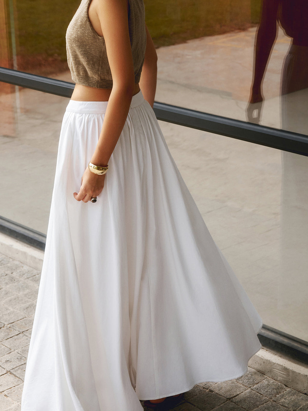 Noor high-waisted pleated a-line maxi skirt