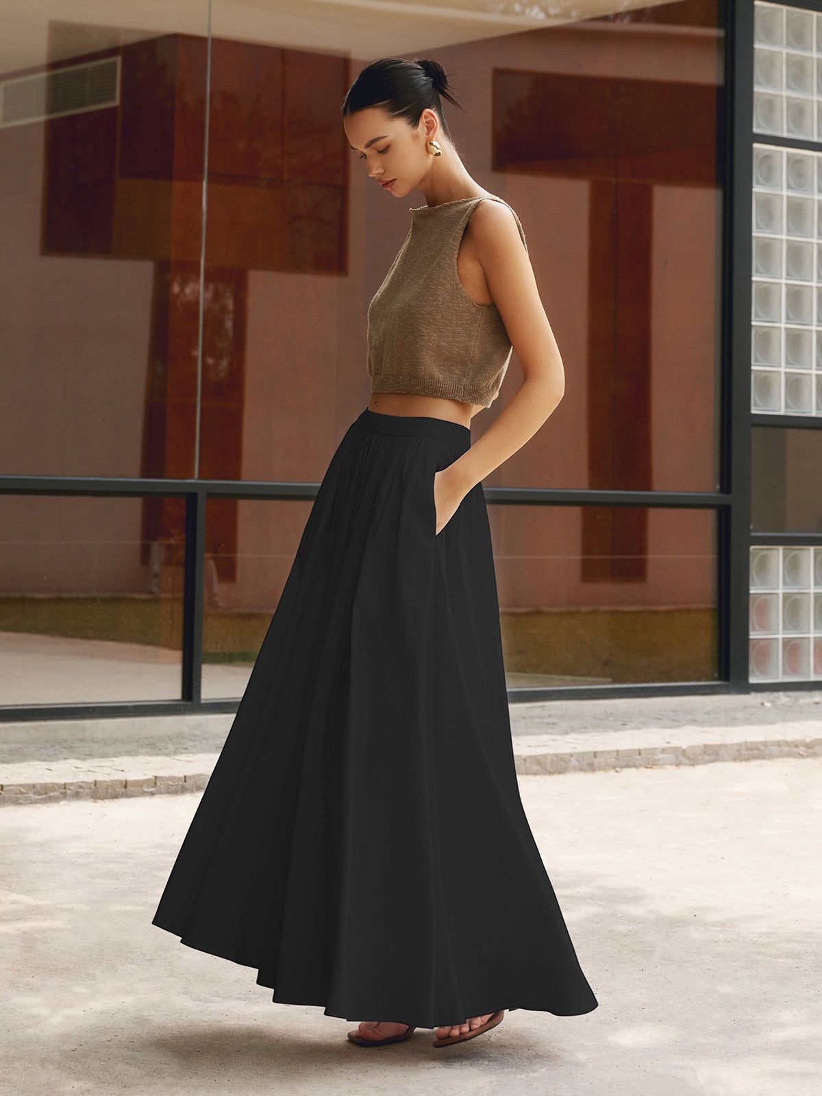 Noor high-waisted pleated a-line maxi skirt