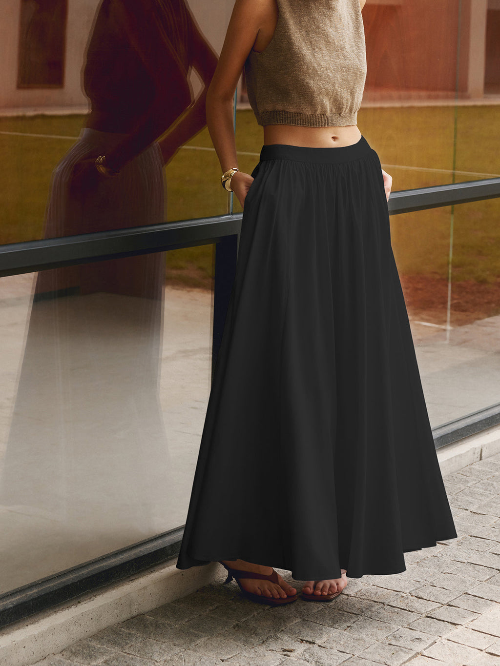 Noor high-waisted pleated a-line maxi skirt