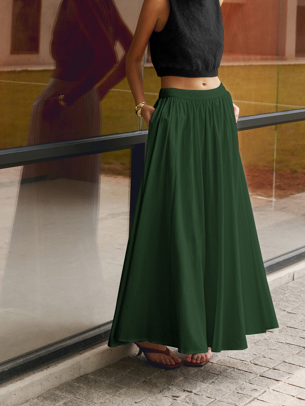 Noor high-waisted pleated a-line maxi skirt