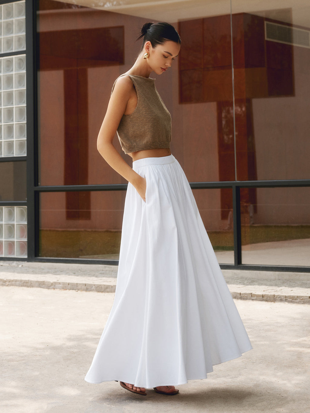 Noor high-waisted pleated a-line maxi skirt