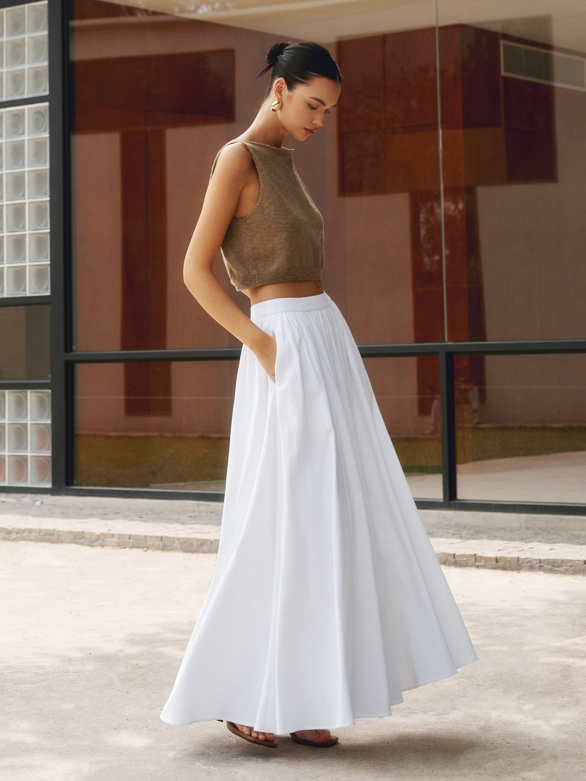Noor high-waisted pleated a-line maxi skirt