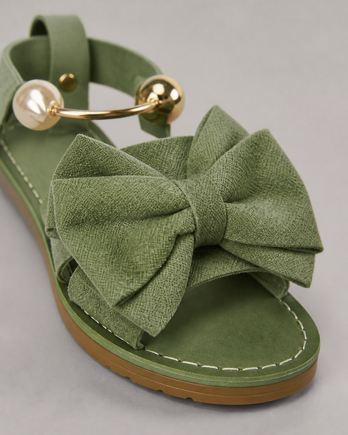 Corwyn Bow Flat Sandals | Women's Pearl Ankle-Cuff Sandals — Green — macro