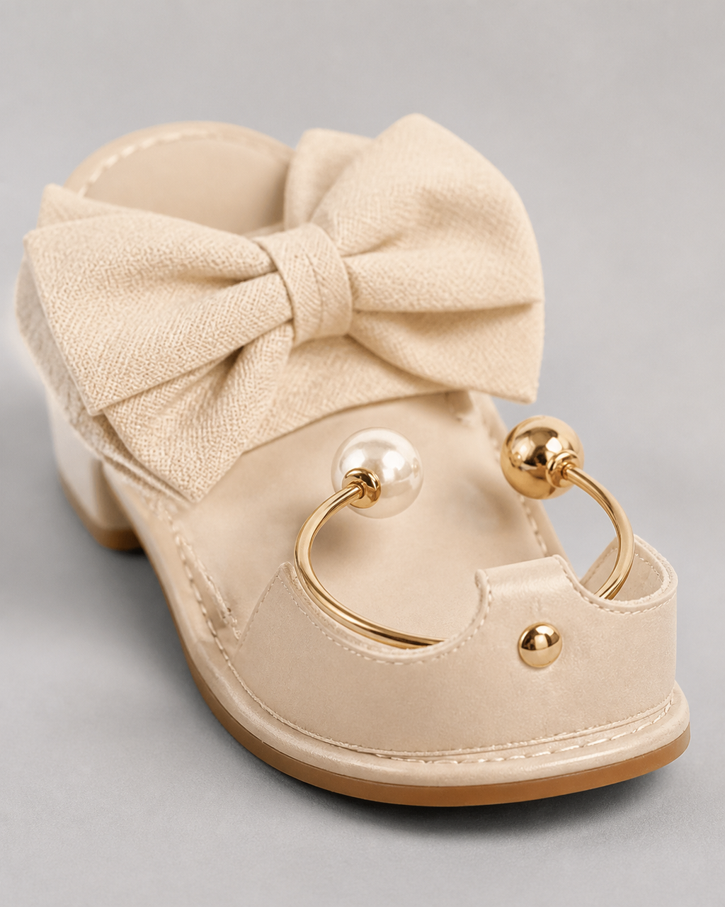 Corwyn Bow Flat Sandals | Women's Pearl Ankle-Cuff Sandals — Cream — macro