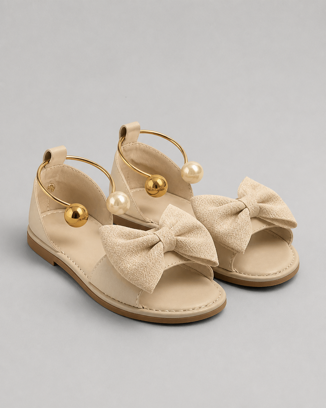 Corwyn Bow Flat Sandals | Women's Pearl Ankle-Cuff Sandals — Cream — hero